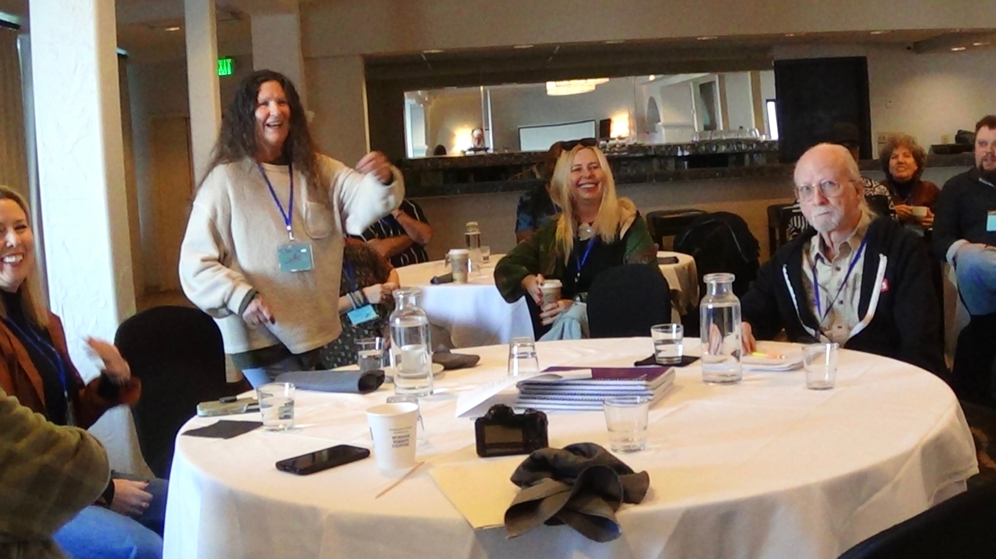 Gathering participants around a conference table