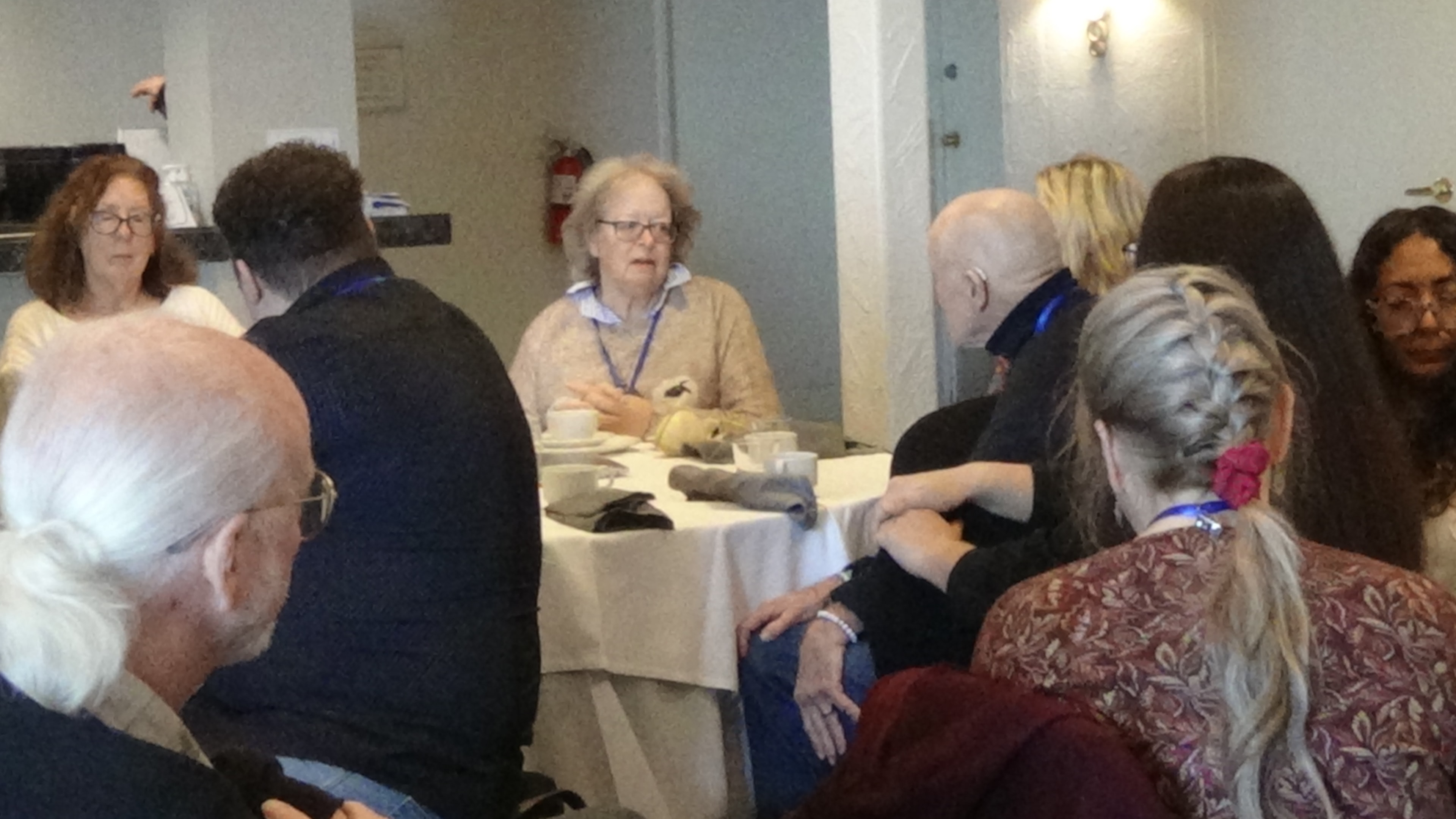 Gathering participants around a table