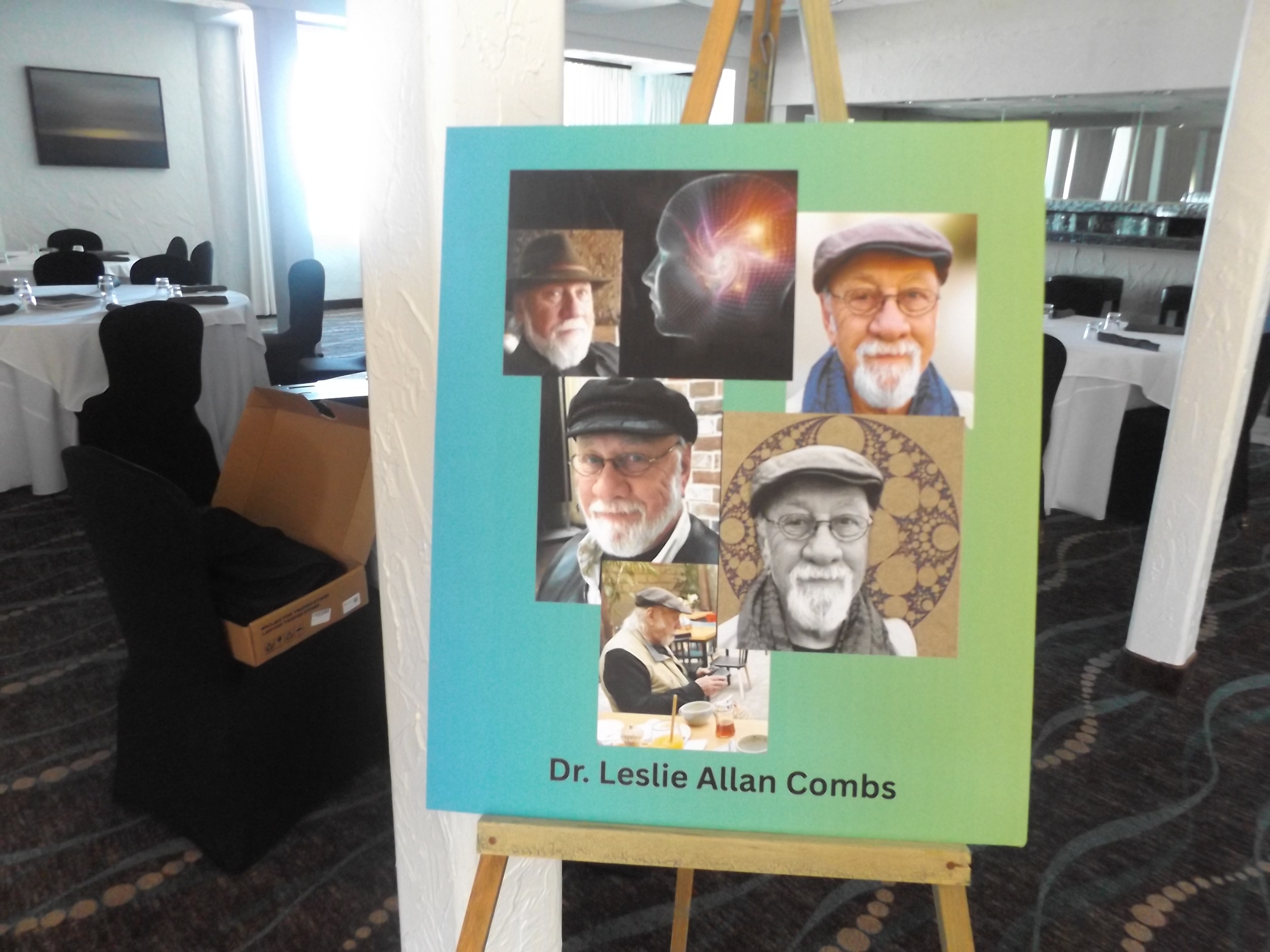 Gathering participant beside event signage