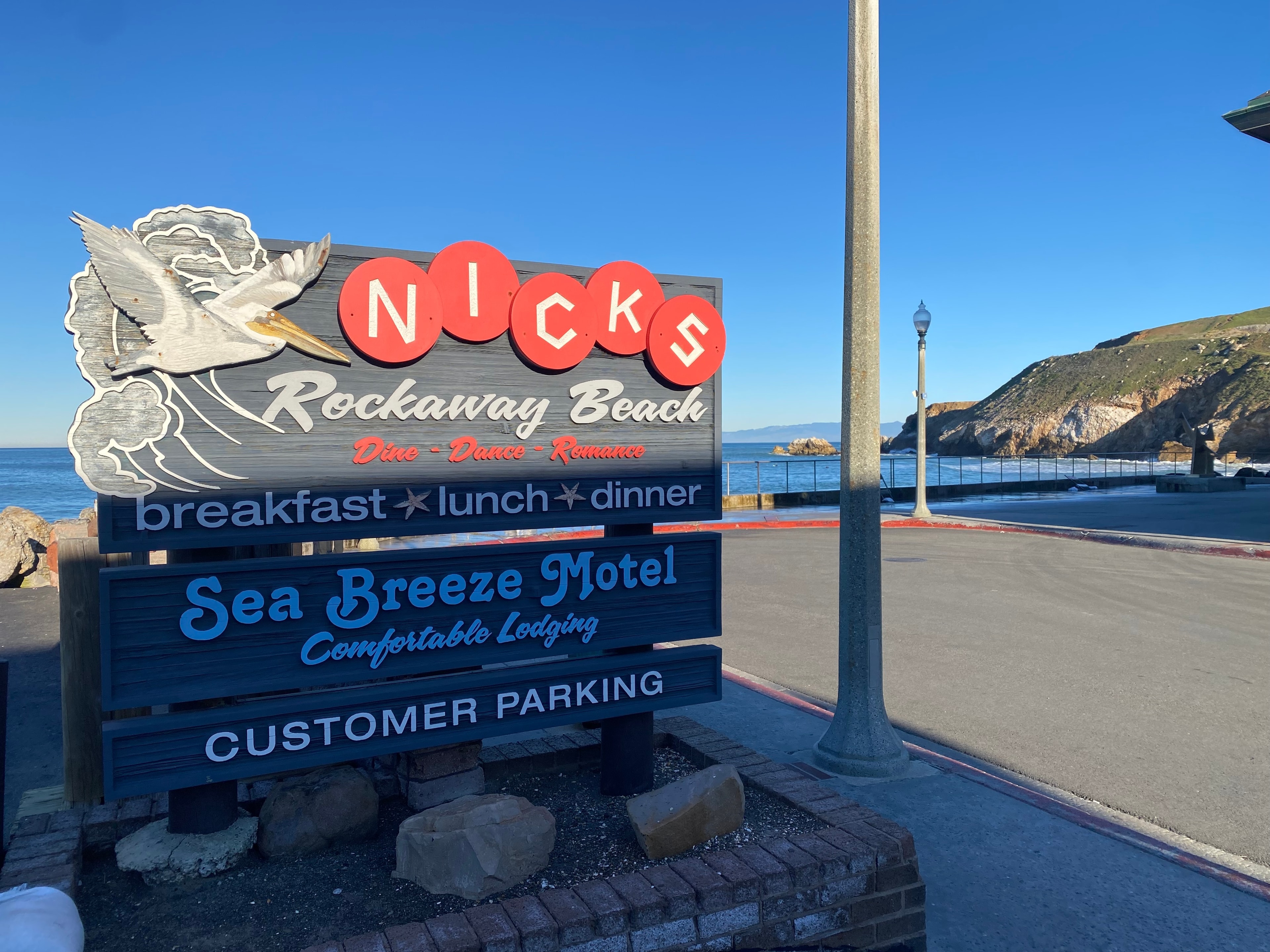 Nick's Rockaway Beach and Sea Breeze Motel sign in Pacifica