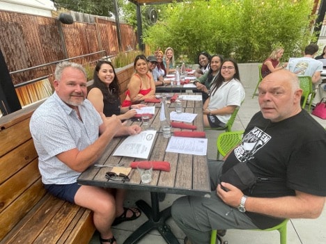 Group dining outdoors at LITF 2025